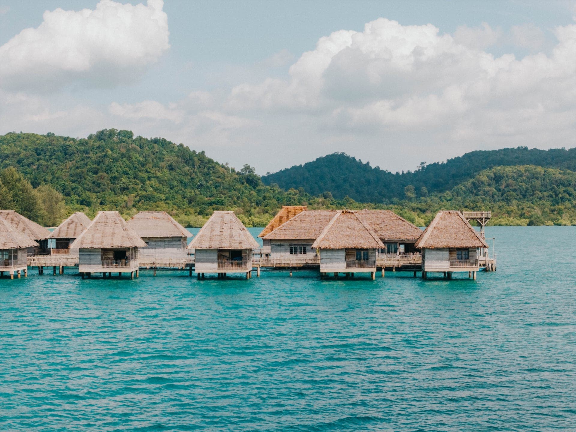 Overwater bungalows at Telunas Beach Resort viewed from the water