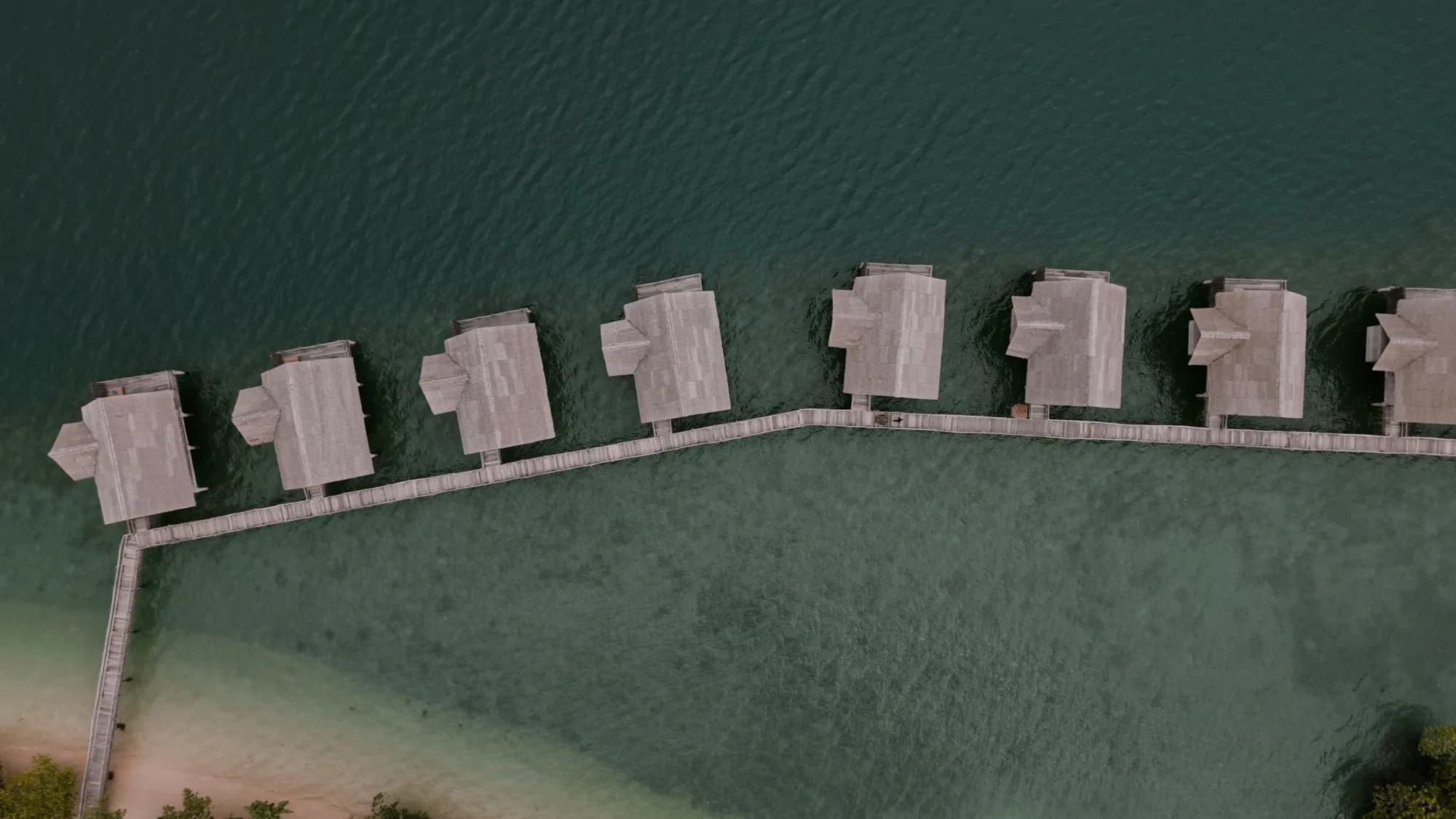 Aerial view of Overwater Villas at Telunas Private Island