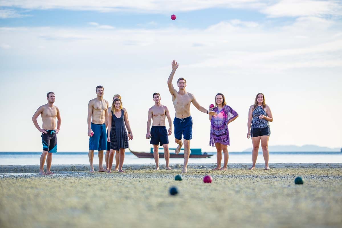 teens playing ball telunas-beach-resort-activities_43213251974_o