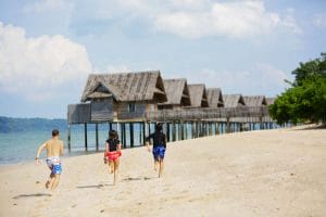 kids running on beach telunas-private-island_44959007194_o