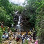 students going on a waterfall hike at Telunas